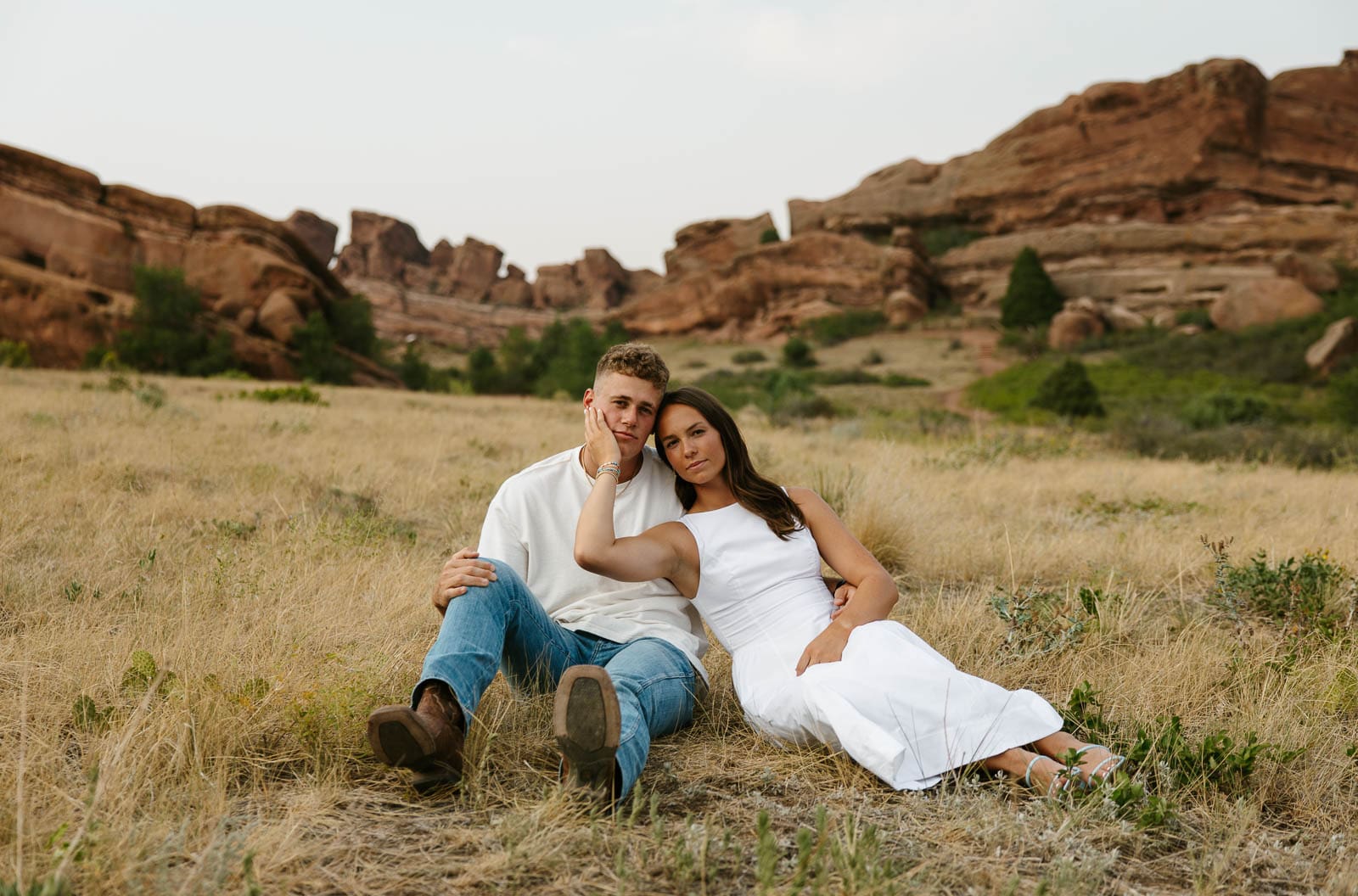 Jordan and Andrew in front of Red Rocks formations during their engagement session